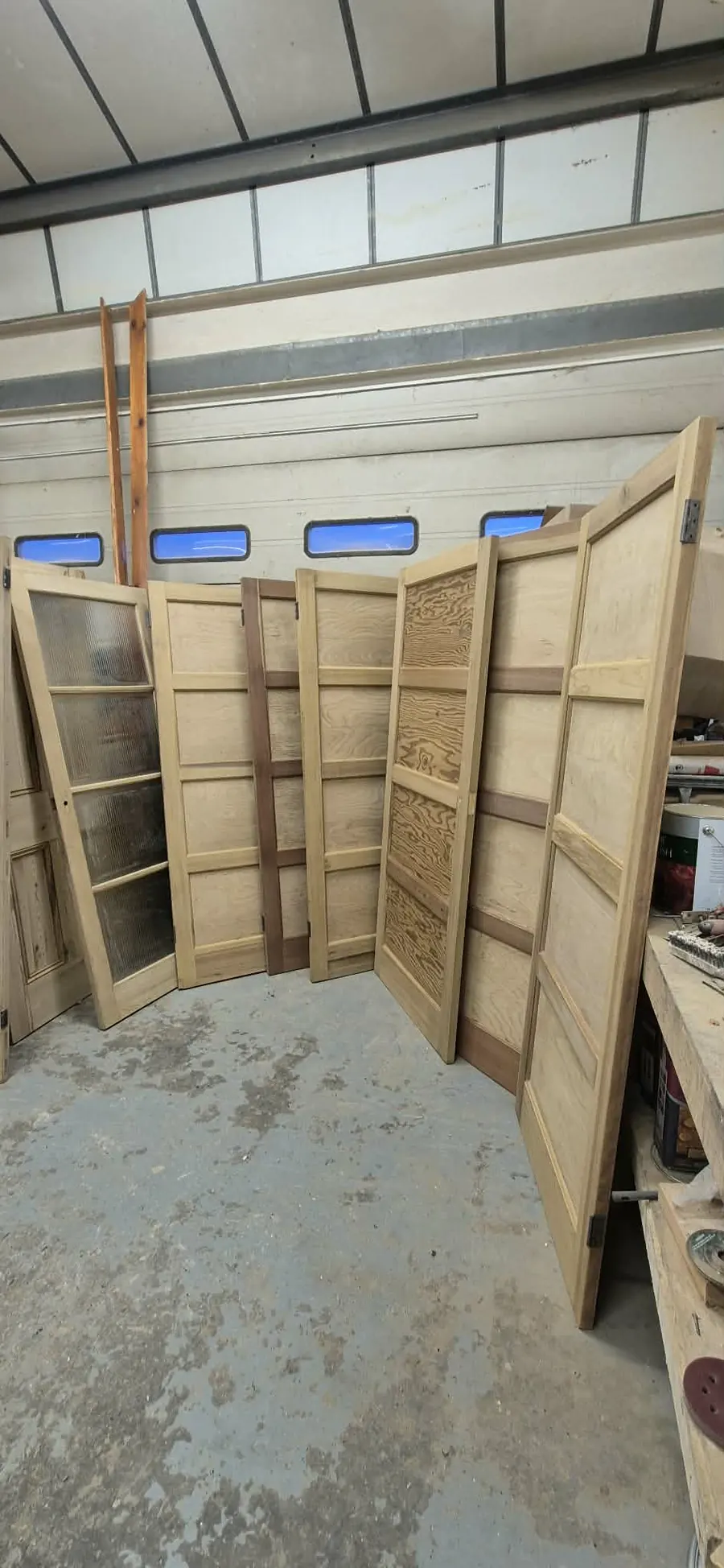 Stripped pine doors in the Global Door Stripping workshop